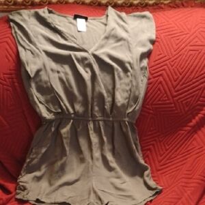 Joe Benbasset Women's Green romper with flowing flap detailing in the sleeve